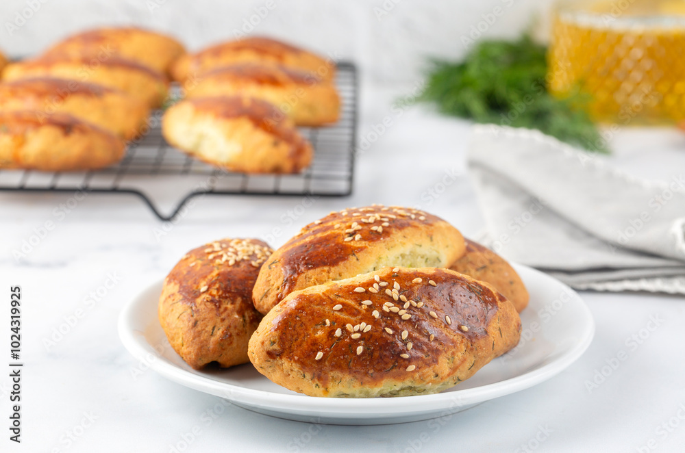 Delicious Turkish food; dill cheese pastry, Turkish name; dere otlu peynirli pogaca Delicious Turkish food; dill cheese pastry, Turkish name; dere otlu peynirli pogaca