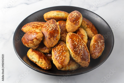 Delicious Turkish food; dill cheese pastry, Turkish name; dere otlu peynirli pogaca photo