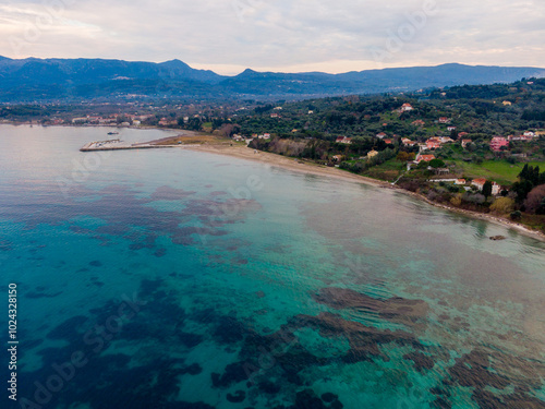 Panoramic view of astrakeri beach with mountains in the background photo