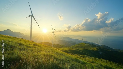 Wind Turbines on a Hilltop at Sunset Overlooking a Coastline