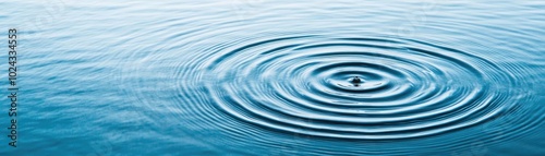 Raindrops hitting the surface of a calm lake, causing ripples that expand outward in perfect circles, raindrops and ripples, gentle water power