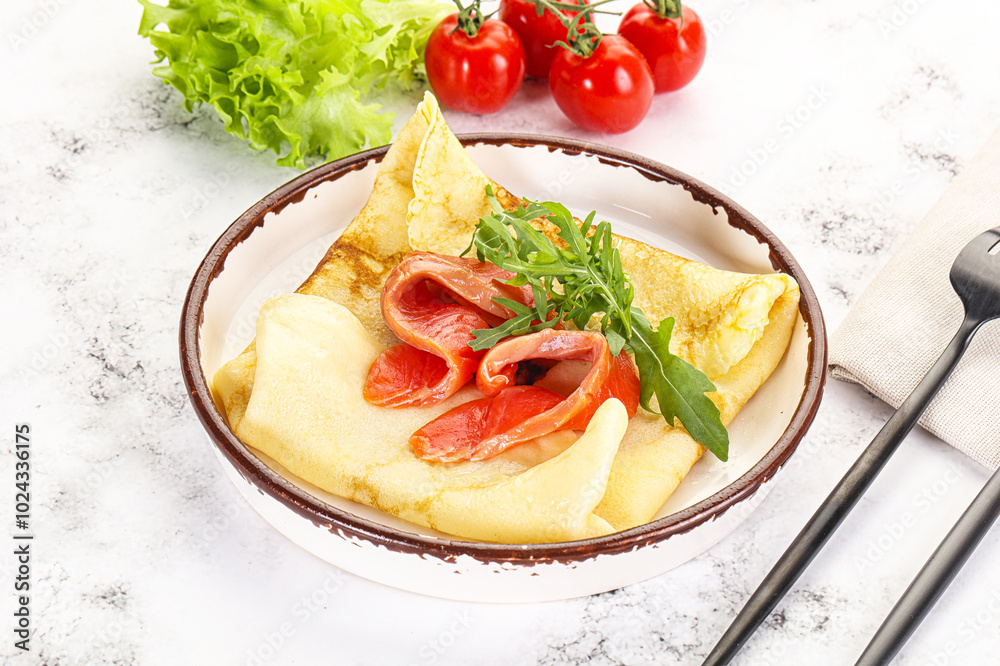 Russian pancake with salmon fish Russian pancake with salmon fish