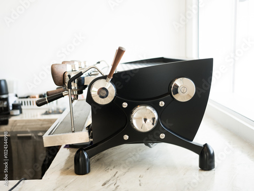 Professional like coffee making machine on table in cafe photo