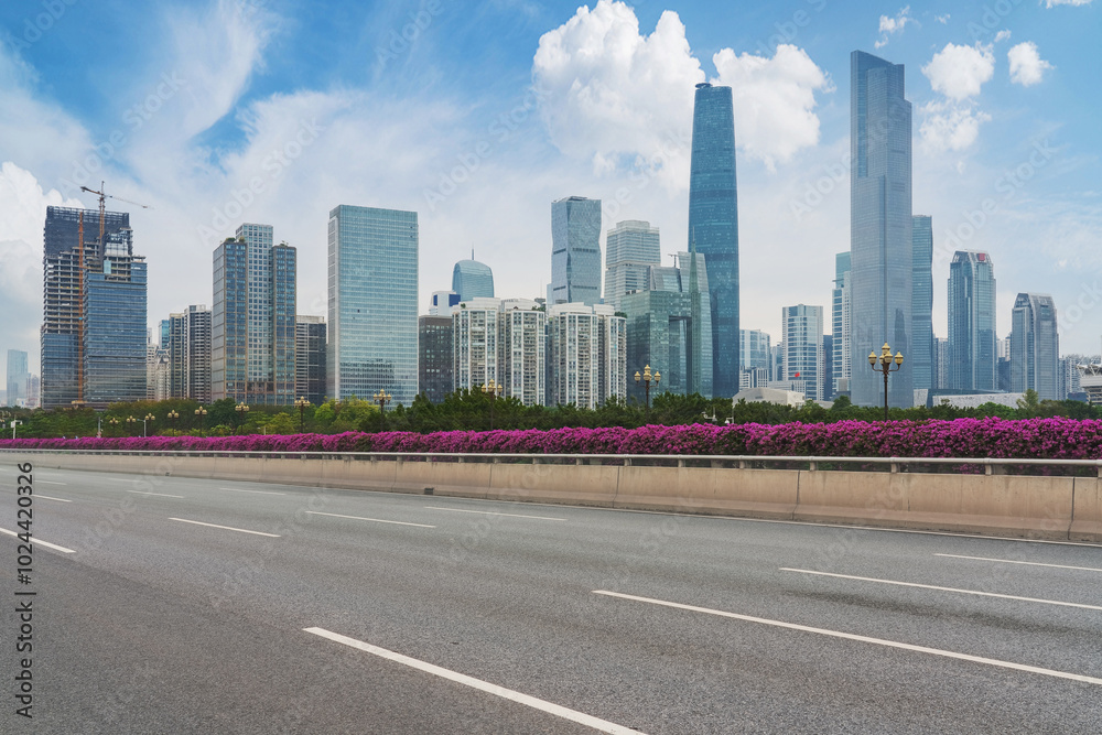 Modern urban skyline, bridges, and asphalt roads in Guangzhou, Guangdong Province, China Modern urban skyline, bridges, and asphalt roads in Guangzhou, Guangdong Province, China