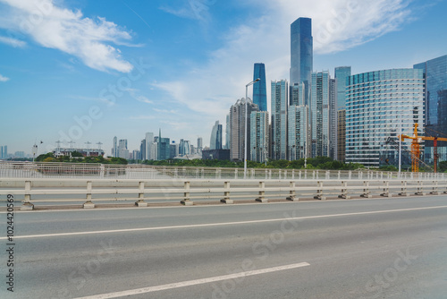 Modern urban skyline, bridges, and asphalt roads in Guangzhou, Guangdong Province, China photo