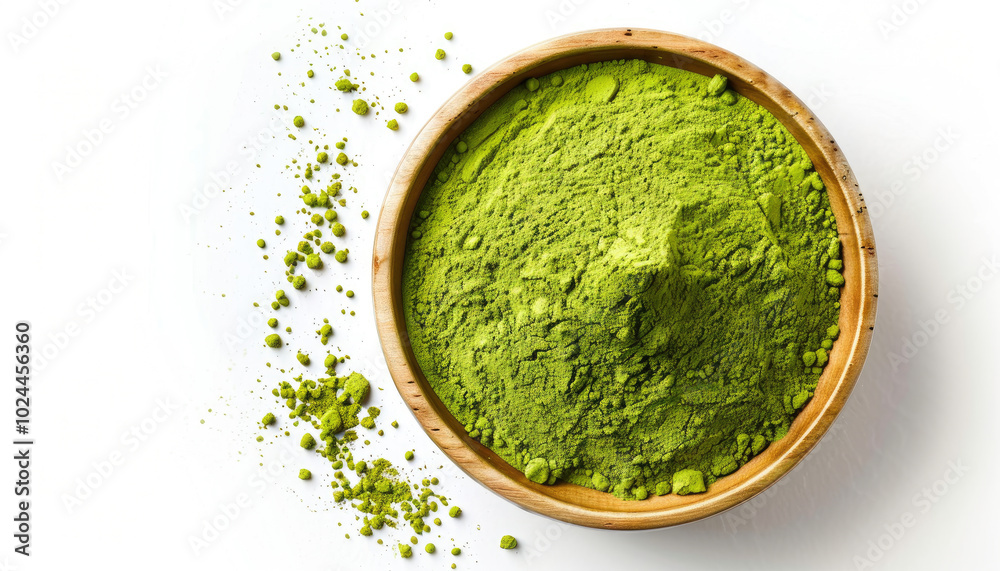 Matcha green tea powder in a wooden bowl Matcha green tea powder in a wooden bowl