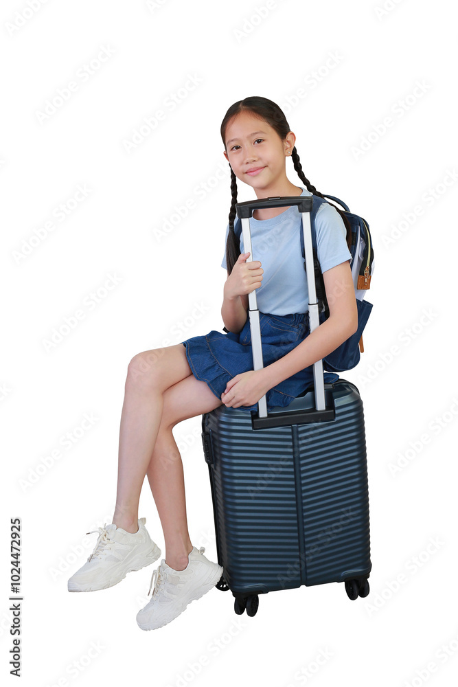 Portrait Asian girl child sitting on suitcase posing and looking straight camera isolated on white background. kid fashion and travel concept. Full body photo with clipping path. Portrait Asian girl child sitting on suitcase posing and looking straight camera isolated on white background. kid fashion and travel concept. Full body photo with clipping path.