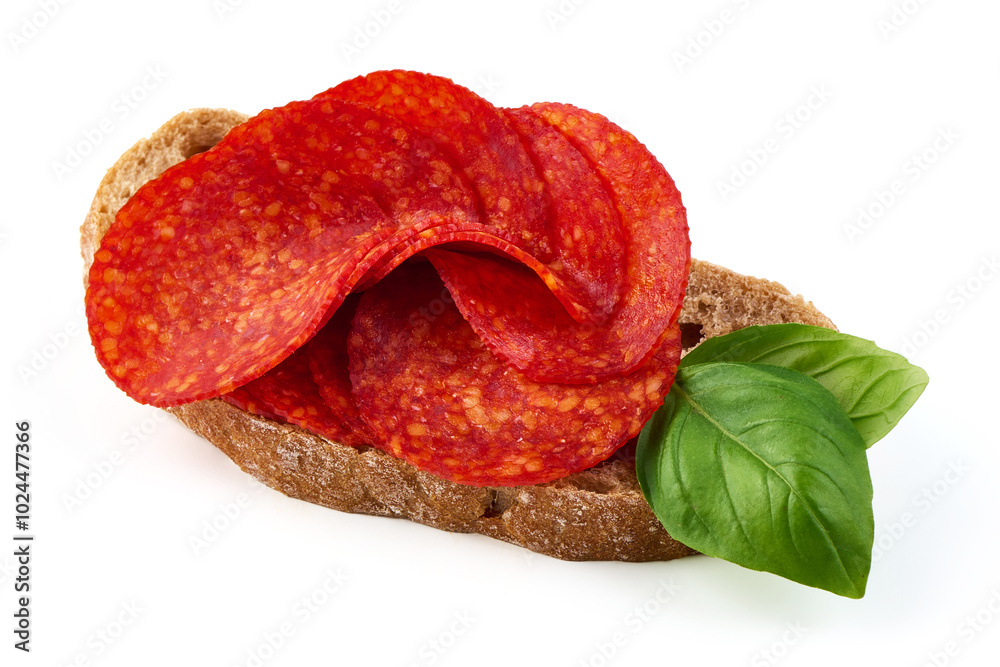 Chorizo sausage sandwich, close-up, isolated on white background.