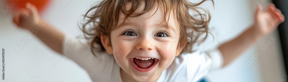 Child jumping in excitement, wide smile on face, isolated, high-angle view, bright colors Child jumping in excitement, wide smile on face, isolated, high-angle view, bright colors