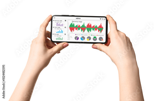 Woman monitoring smart meter readings on mobile phone on white background, closeup