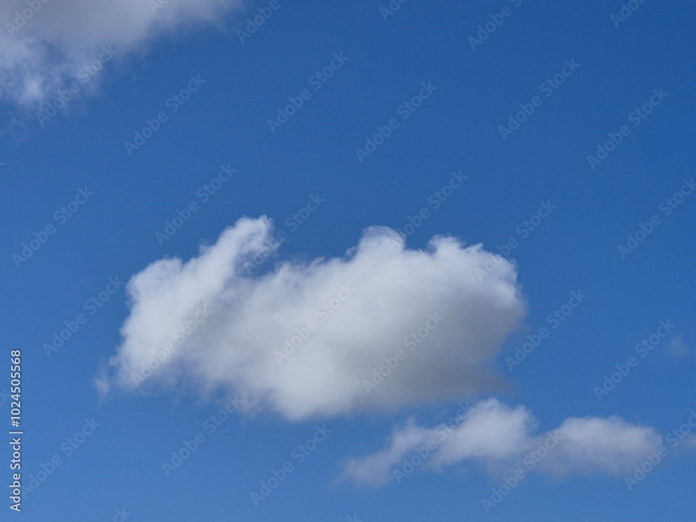 White clouds in summer sky background White clouds in summer sky background