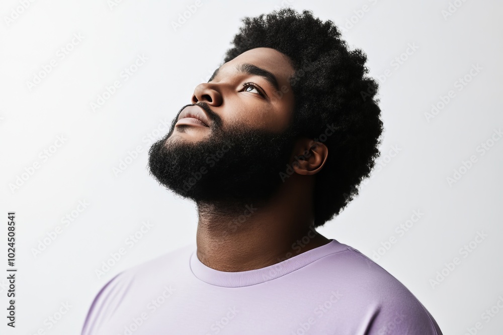 A character or illustration with purple top and facial hair A character or illustration with purple top and facial hair