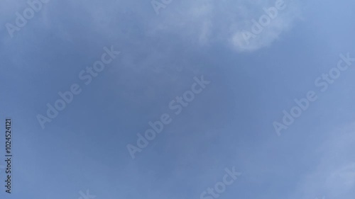 4K Timelapse of Blue Sky with Clouds in summer. photo