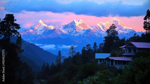 A sunrise over the Himalayas, with the peaks glowing in the early morning light