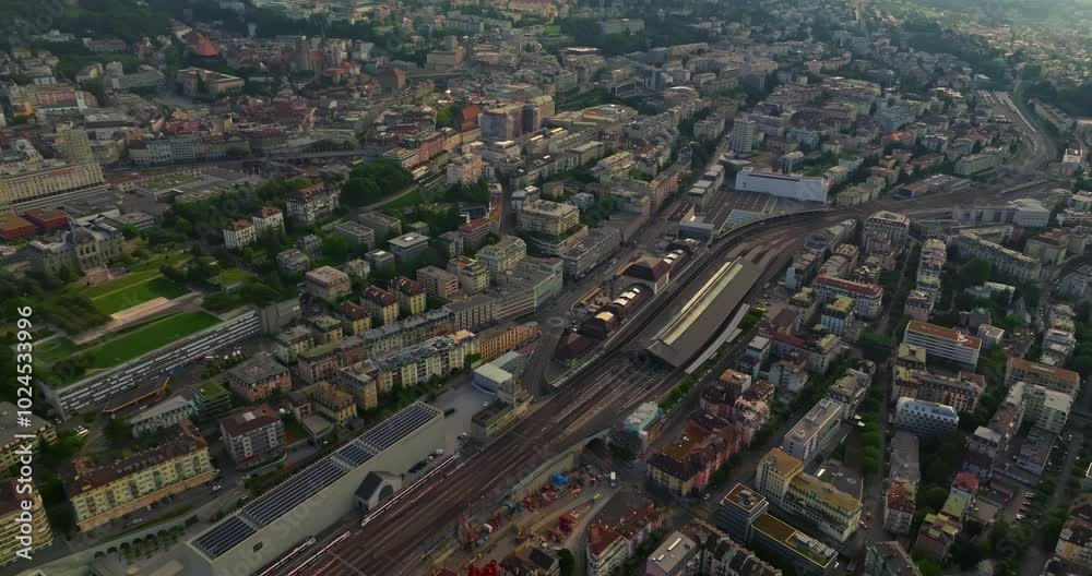 Lausanne is a modern city in the French-speaking Swiss canton of Vaud on the shores of Lake Geneva. A drone flies through city center of Switzerland from above aerial view by drone Lausanne is a modern city in the French-speaking Swiss canton of Vaud on the shores of Lake Geneva. A drone flies through city center of Switzerland from above aerial view by drone