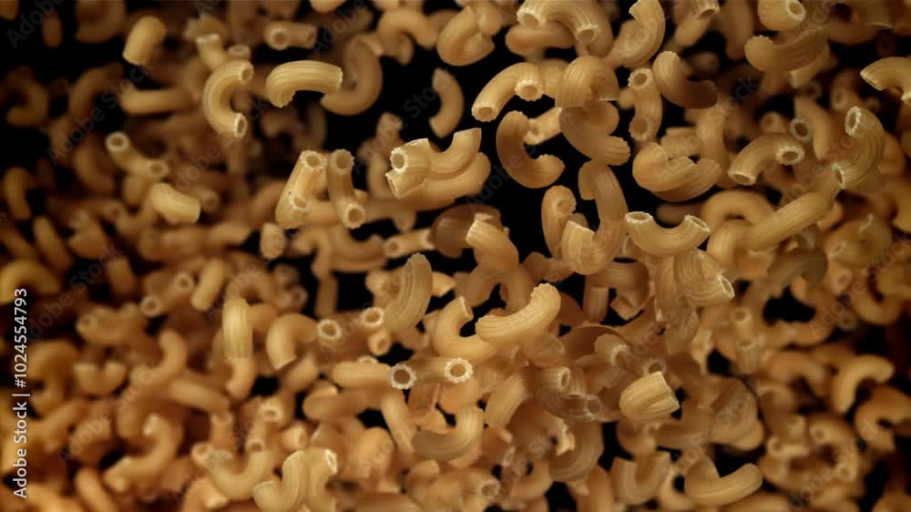 The dry pasta flies up and falls down. Filmed on a high-speed camera at 1000 fps. High quality FullHD footage The dry pasta flies up and falls down. Filmed on a high-speed camera at 1000 fps. High quality FullHD footage