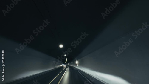 Car point of view driving in tunnel