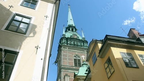 The tower of Tyska Kyrkan, the German Church, between the typical swedish buildings of Stockholm, capital of Sweden. Different shots available in my portfolio. photo