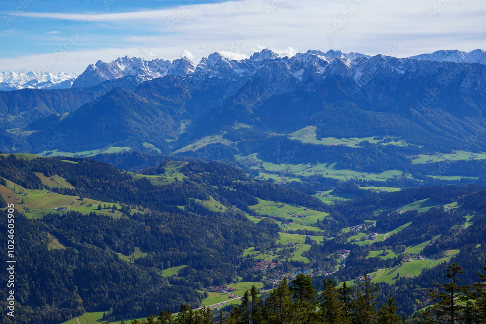Breathtaking views from Spitzstein, a popular hiking mountain (Bavarian-Tyrolean border), over the Inn Valley to the Kitzbühel Alps in classic autumn light