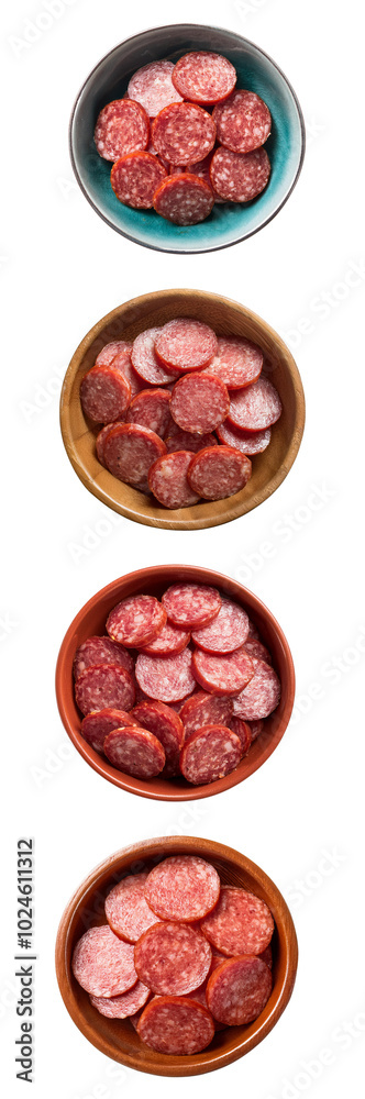 Sliced pepperoni pieces in varied bowls on a white background, perfect for culinary use and food styling. Sliced pepperoni pieces in varied bowls on a white background, perfect for culinary use and food styling.