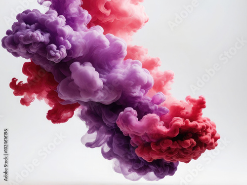 Acrylic color pigment and ink cloud in water. Abstract smoke on white background with copy space. Fancy dream cloud of ink underwater. Purple, blue and pink colors