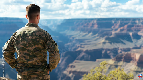 A veteran serviceman standing at the edge of the Grand Canyon, looking out over the vast landscape, his uniform billowing in the wind as he reflects on freedom and his service.