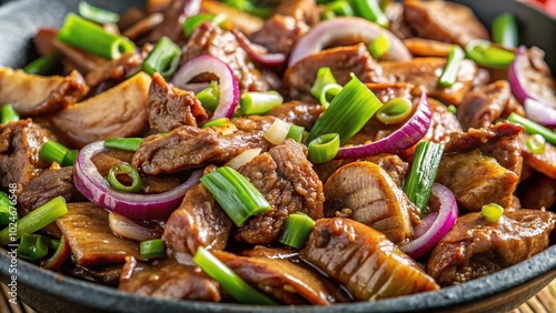 Stir fried pork kidney in oyster sauce with onions, extreme close-up