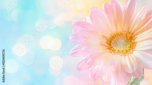  A zoomed-in picture of a vivid pink blossom surrounded by a hazy mix of blue and yellow light