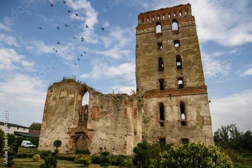 Picturesque ruins of Our Lady of the Rosary Church and Dominican Monastery with defensive tower in Starokostiantyniv, Khmelnytskyi region, Ukraine.  photo