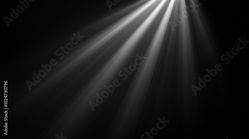 White light beam on a black background, with light from the side, a spotlight, and light streaks and rays