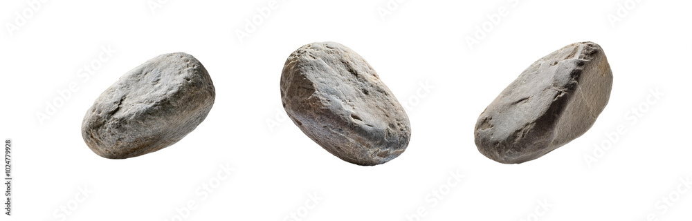 Fototapeta premium Three isolated gray stones, each with a unique shape and texture, are shown against a white background.