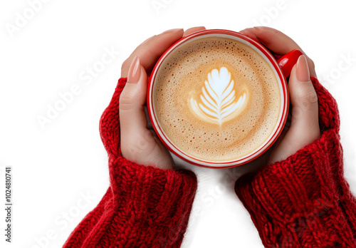 Warm hands holding a cozy latte with beautiful latte art in a serene indoor s...