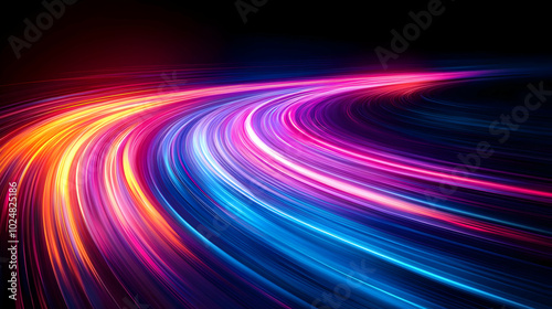 Vibrant abstract light trails creating a dynamic, colorful flow.