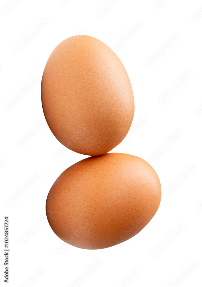 Top view of two fresh brown chicken eggs in stack isolated on white background with clipping path Top view of two fresh brown chicken eggs in stack isolated on white background with clipping path