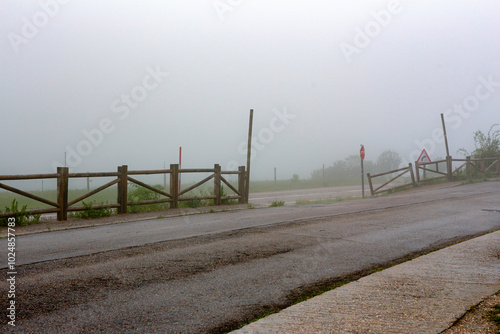 Empty mountain road with fog