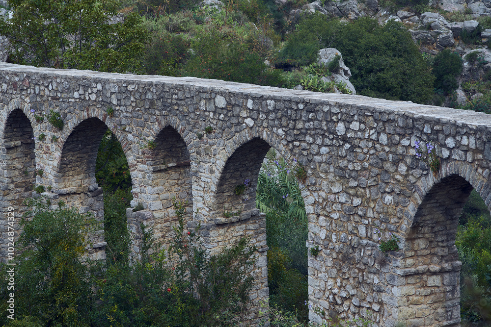 Fototapeta premium an old stone viaduct bridge