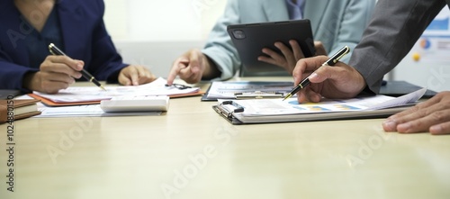 Group of business people discussing work and agreeing to work together. Business people discussing projects in office using laptops. Business people shaking hands in conference room. Video.