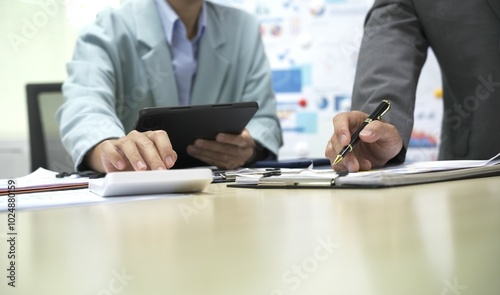 Group of business people discussing work and agreeing to work together. Business people discussing projects in office using laptops. Business people shaking hands in conference room. Video.