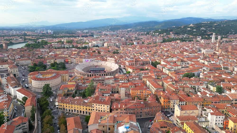 Italy, October 10, 2024: Panoramic aerial view of the beautiful city of love, Verona, in Veneto with its wonderful Arena and the Adige river Italy, October 10, 2024: Panoramic aerial view of the beautiful city of love, Verona, in Veneto with its wonderful Arena and the Adige river