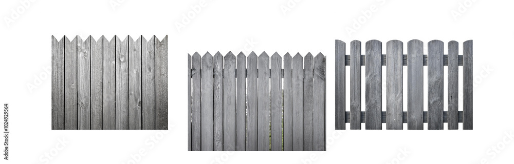 Fototapeta premium A close-up of a gray wooden fence with a variety of slat designs.