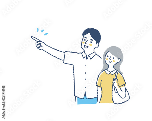 遠くを指さす男性とそちらを見ている女性