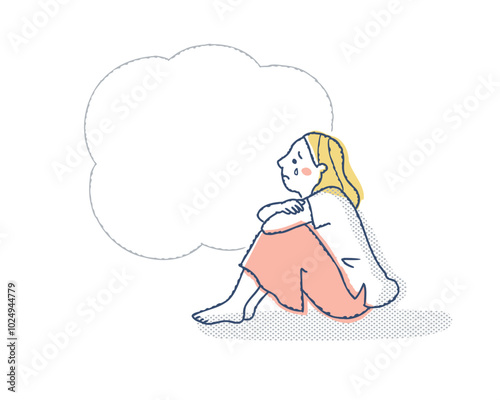 膝を抱えて泣いている女性とふきだし