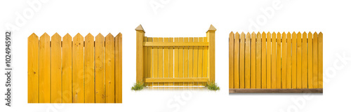 A yellow wooden fence with pointy tops and a small gate.