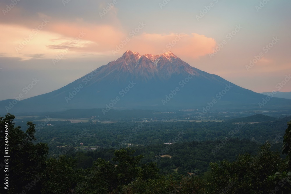 Mount Kenya Landscape With Warm Golden Peak Against A Cloudy Sky And Sprawling Green Valley Mount Kenya Landscape With Warm Golden Peak Against A Cloudy Sky And Sprawling Green Valley