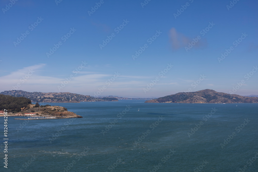 Breathtaking view of San Francisco Bay from the Golden Gate Bridge, showcasing the natural beauty and iconic landmarks of California's Bay Area. Breathtaking view of San Francisco Bay from the Golden Gate Bridge, showcasing the natural beauty and iconic landmarks of California's Bay Area.