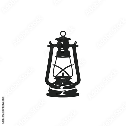 An old-fashioned black and white oil lamp with a glass shade and a metal frame 