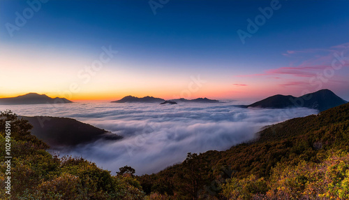 Ocean at Twilight with a view of cloud inversion and mountains