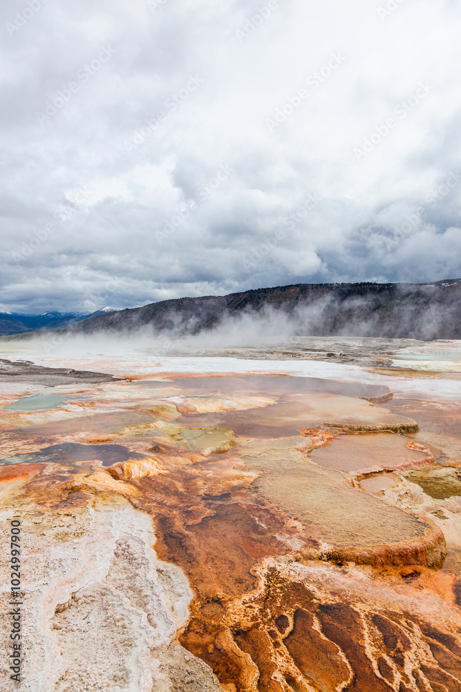 Scenic View of Geothermal Hot Springs in Yellowstone National Park, Wyoming Amidst Majestic Natural Landscapes Scenic View of Geothermal Hot Springs in Yellowstone National Park, Wyoming Amidst Majestic Natural Landscapes