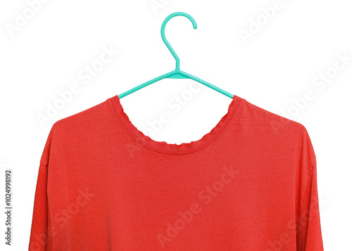 Old T-shirt and hanger isolated on white