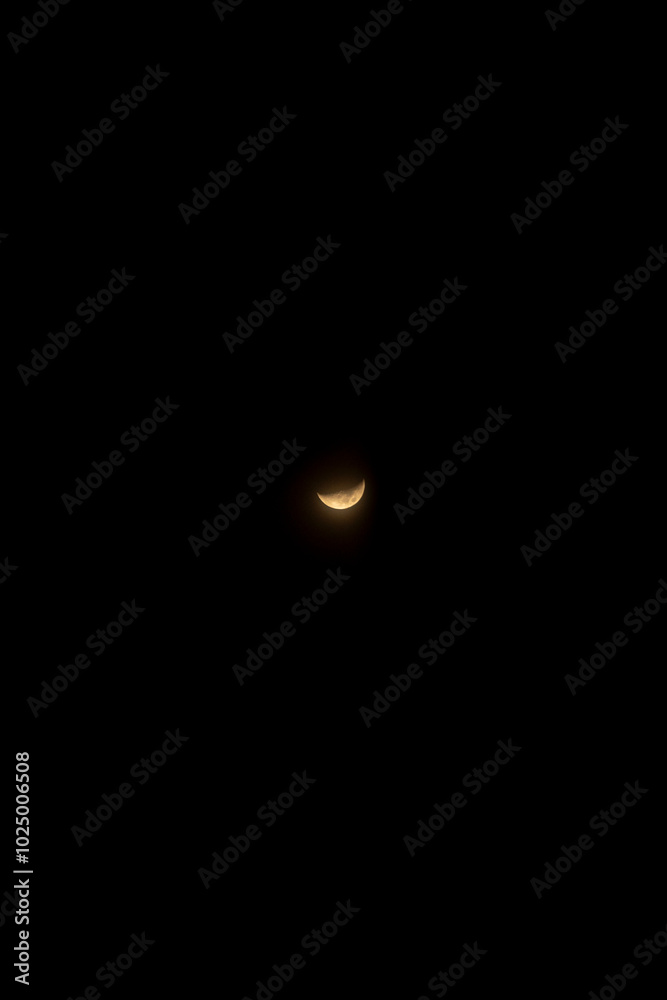 A sharp and clear crescent moon shines brightly against a deep black night sky, capturing the calm and peaceful energy of the night, symbolizing serenity and celestial beauty in its simplest form. A sharp and clear crescent moon shines brightly against a deep black night sky, capturing the calm and peaceful energy of the night, symbolizing serenity and celestial beauty in its simplest form.